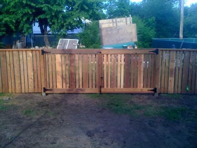 Fence line with a wood gate